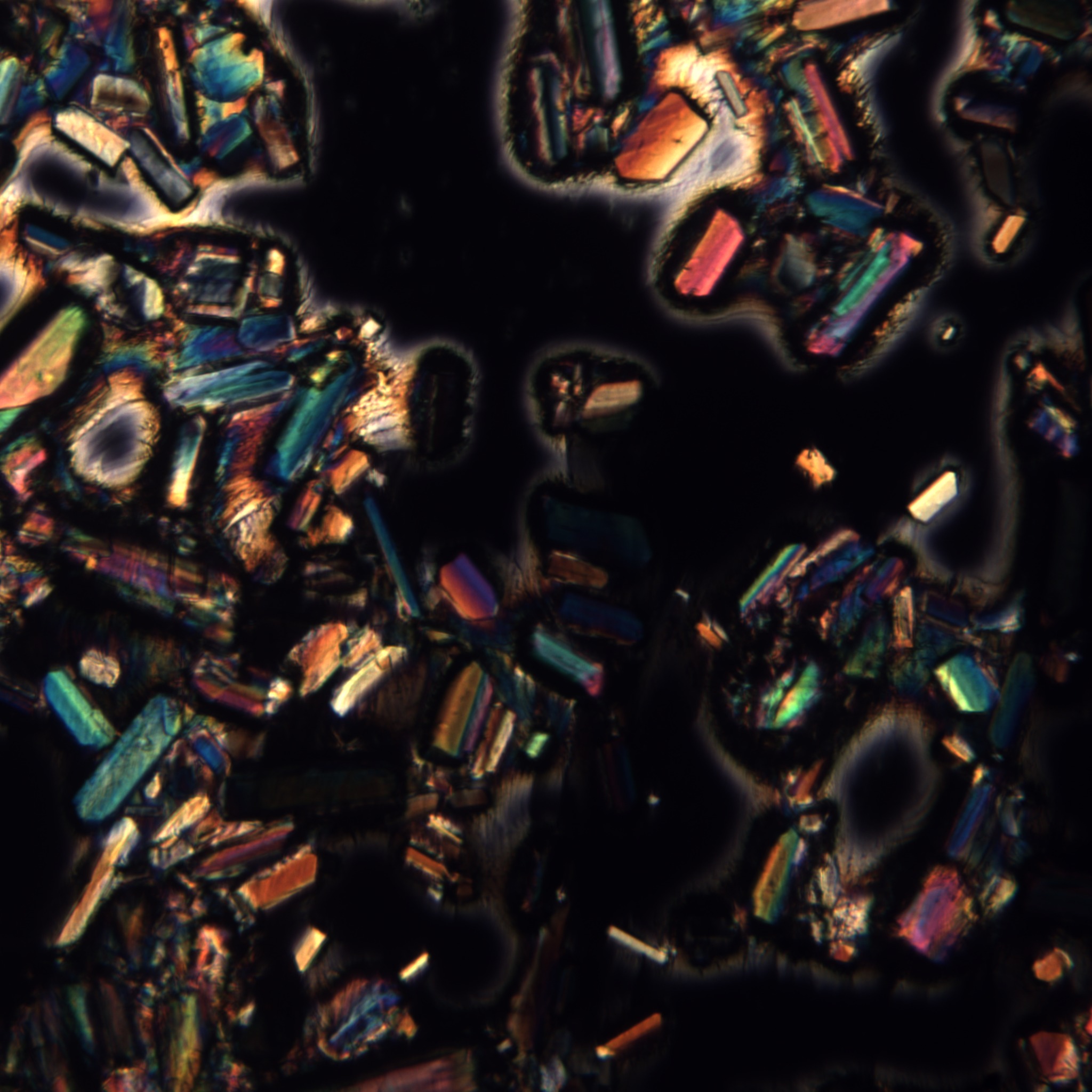 Crystal structure formed from cremated remains, cross-polarized light detail