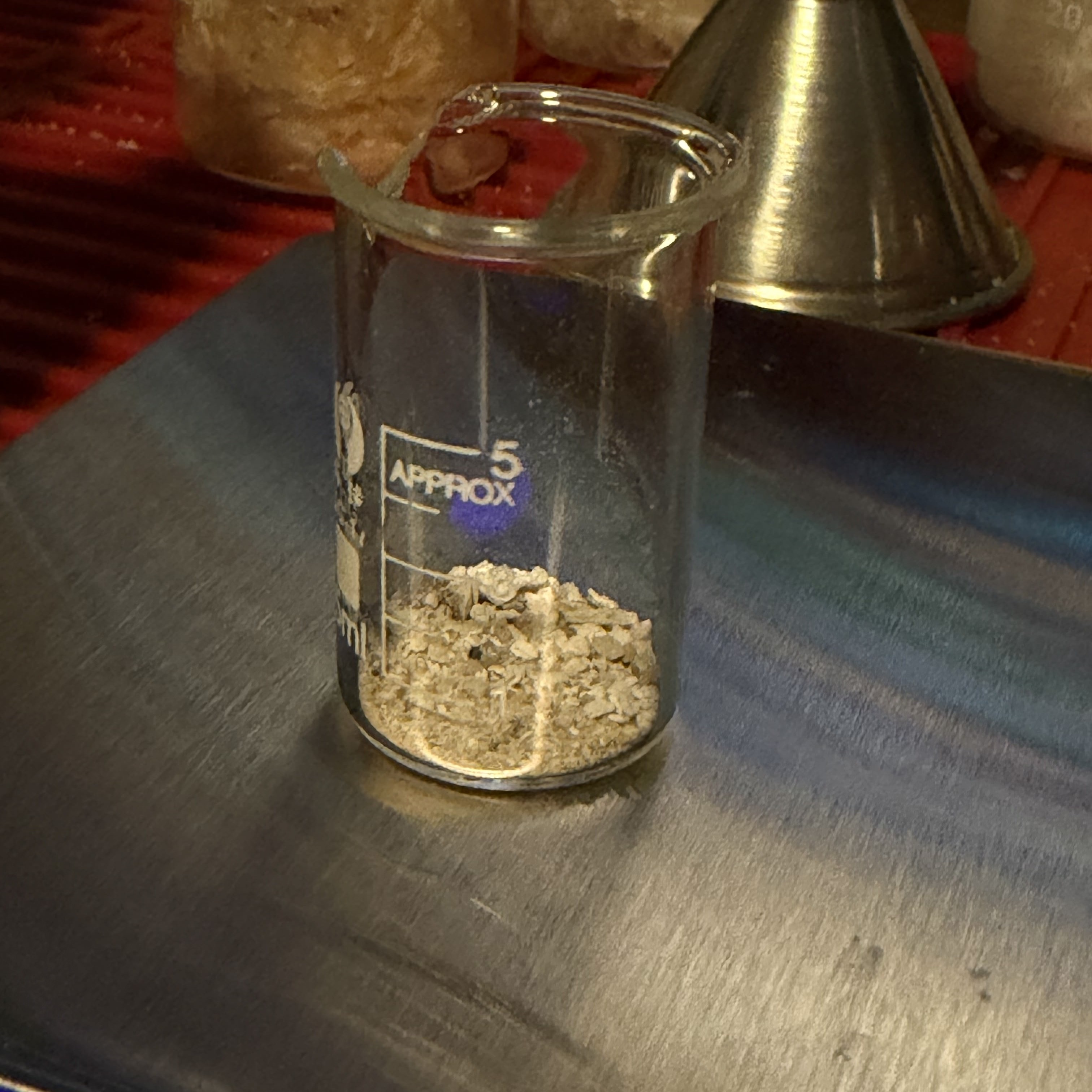 A small measured sample being prepared for the crystal growth process